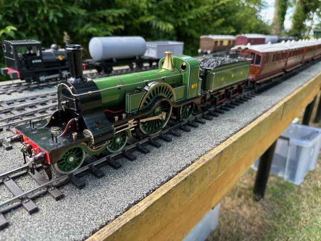 Brake, First class and Third class coaches behind a Stirling Single